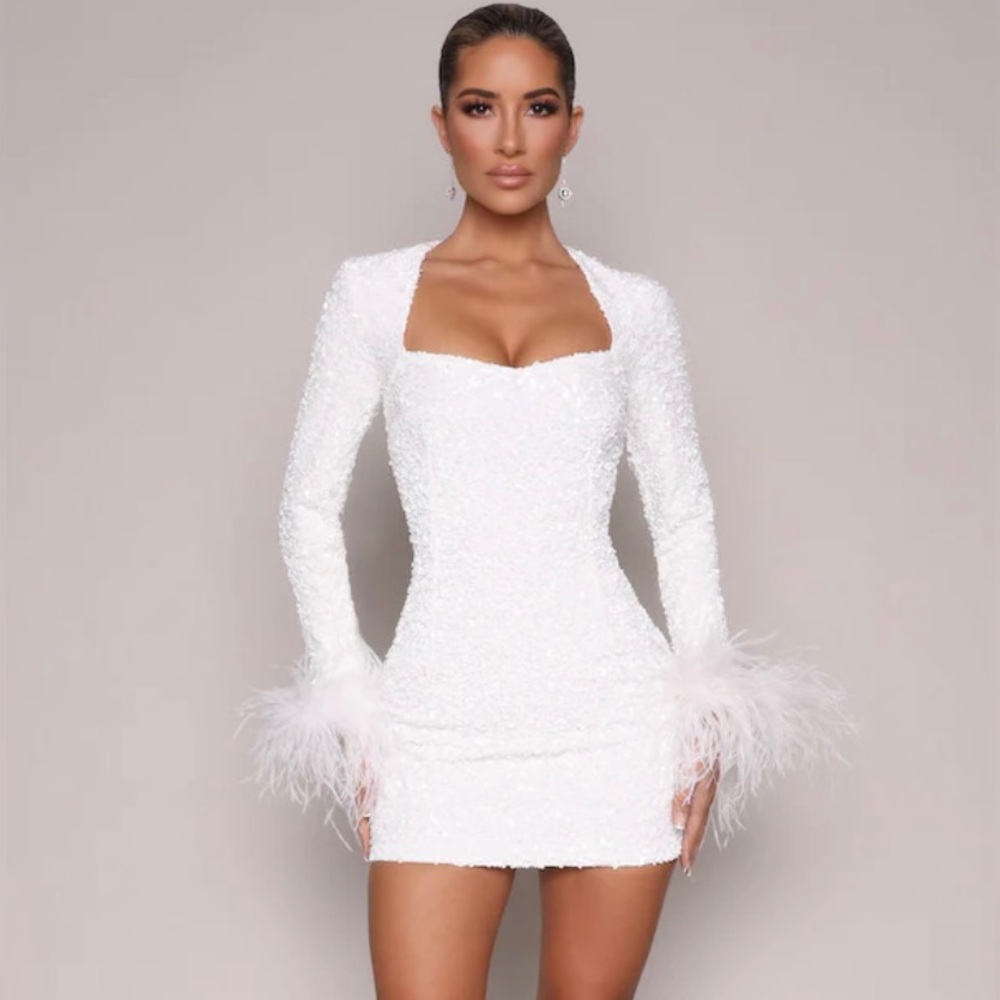 Beautiful white sequen dress. Sexy and perfect to feel amazing.